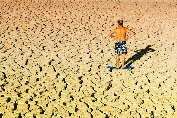 istock young practicing diving in a dry swamp 579442422