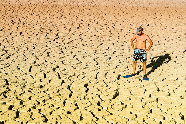 istock young practicing diving in a dry swamp 579442682