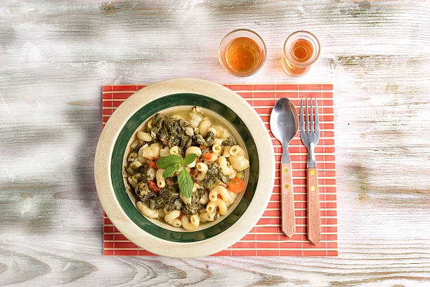 soup with vegetables and pasta - basil tomato soup food and drink imagens e fotografias de stock