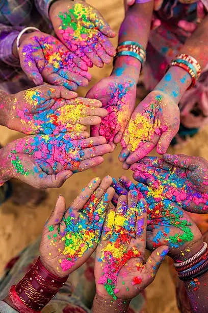 Photo of Group of Indian children playing holi in Rajasthan, India