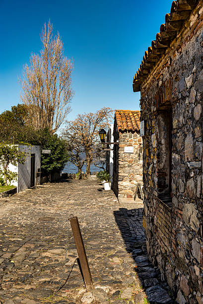 Colonia del Sacramento, Uruguay - July 7, 2016: View of some old buildings on the streets of the historic district of Colonia del Sacramento by the border of the La Plata River (Río de la Plata) in Uruguay