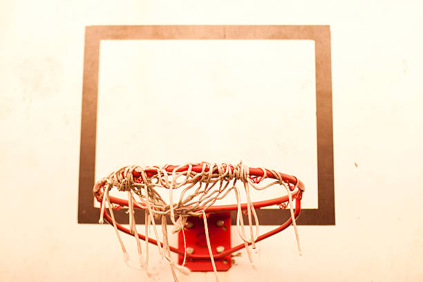 istock Basketball hoop with torn mesh 579445198