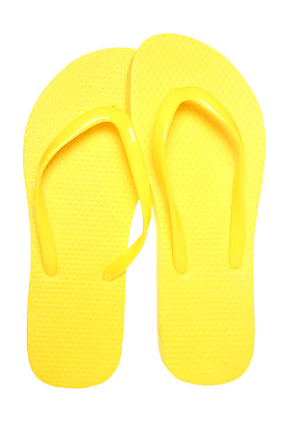 istock pair of yellow flip flops 579445510