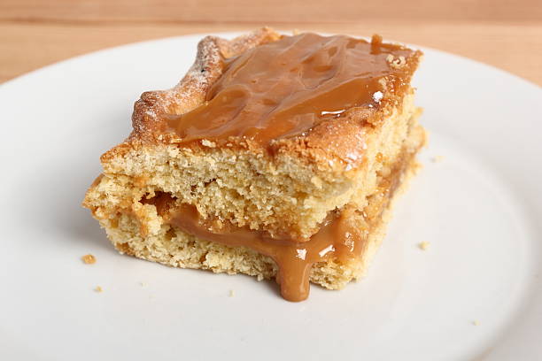 istock Shortcrust pastry cake covered with fudge caramel cream 579447598