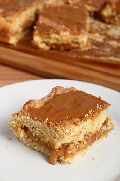 istock Shortcrust pastry cake covered with fudge caramel cream 579447636