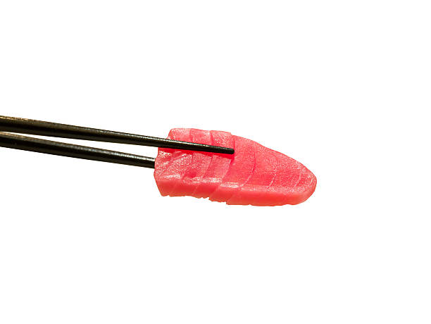 istock tuna sashimi in chopsticks 579447808
