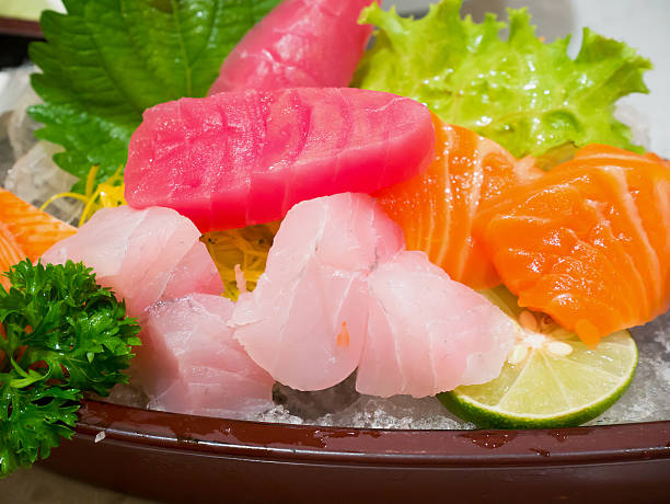 istock fresh salmon fish slice sashimi with tuna sashimi 579731138