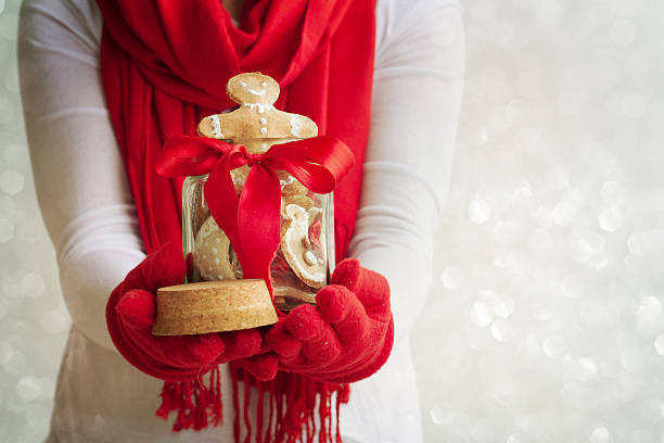 istock Female hands holding a christmas cookies 579731250