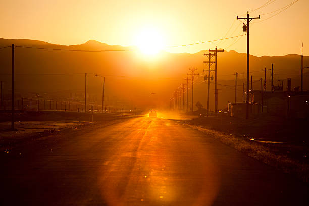 A lone vehicle rolls down a street in Wendover Utah