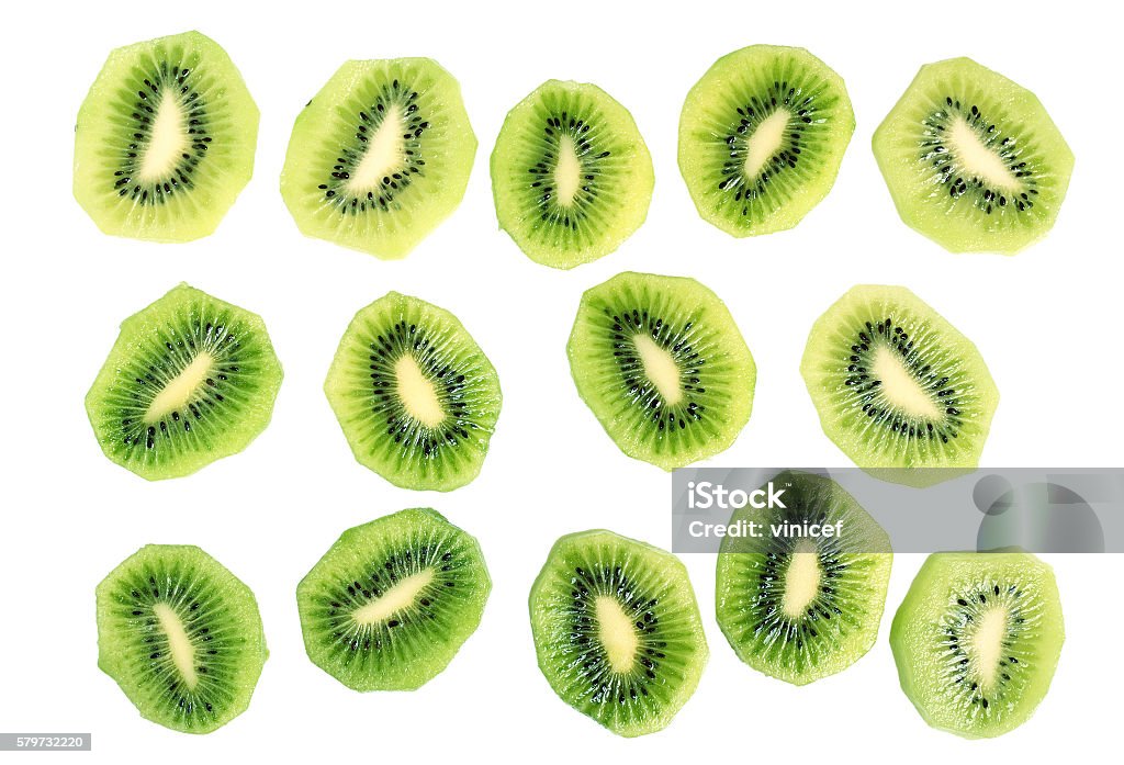 Kiwi slices (kiwifruit). Isolated on white background. Kiwi slices (kiwifruit). Isolated on white background. Directly Above. Berry Stock Photo