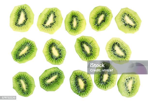 Kiwi Slices Isolated On White Background Stock Photo - Download Image Now