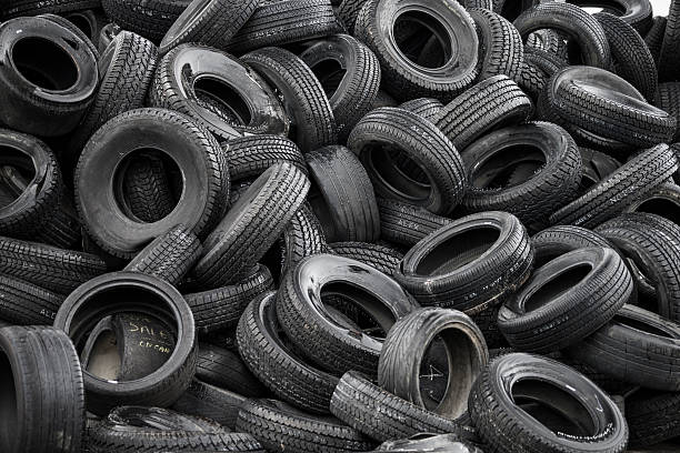 istock Pile of rubber car tires 579733406