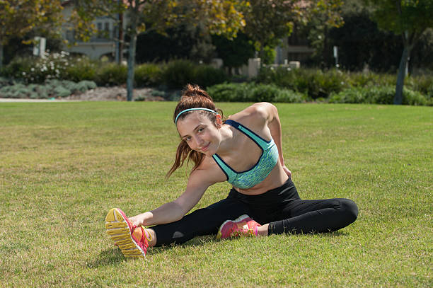 istock Muscular girl warming up 579733674