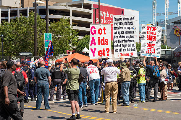 Angry rally Cleveland, United States - July 20, 2016: A hard-core extremist religious group draws a crowd of the curious onlookers on Prospect Avenue during the Republican National Convention. rnc stock pictures, royalty-free photos & images