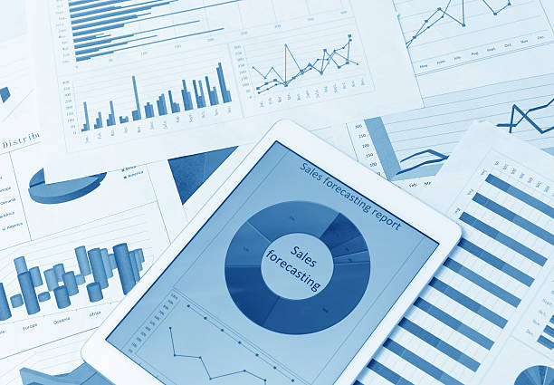 istock Financial charts on the table with tablet 579735142