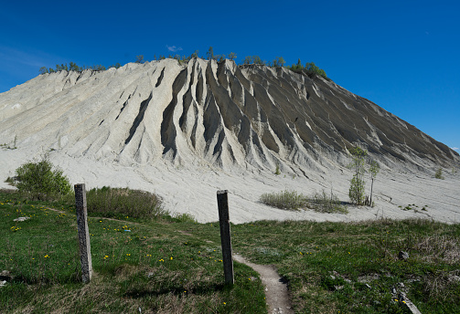 Mountain in the abandoned mines. Quarry and old prison architecture. The ashes dunes in  Estonia, Europe.