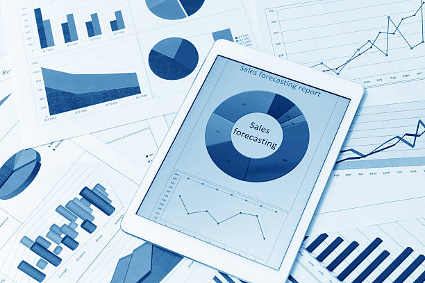 istock Financial charts on the table with tablet 579736394