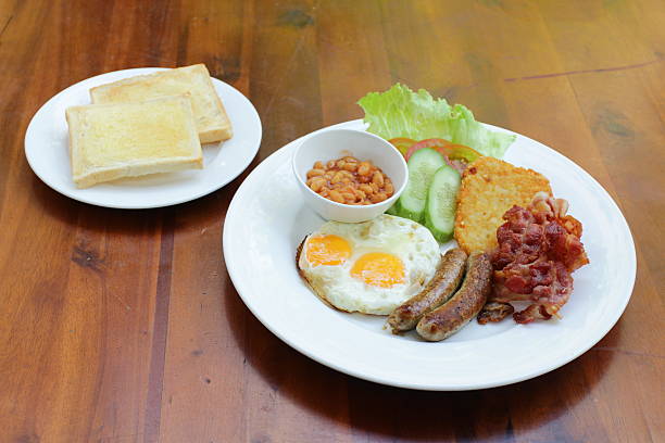 istock plate with boiled rice egg and sausage, fry shrimp, bacon 579737018
