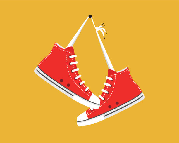 illustrazioni stock, clip art, cartoni animati e icone di tendenza di scarpe da ginnastica sportive vecchio stile appese - scarpe da ginnastica