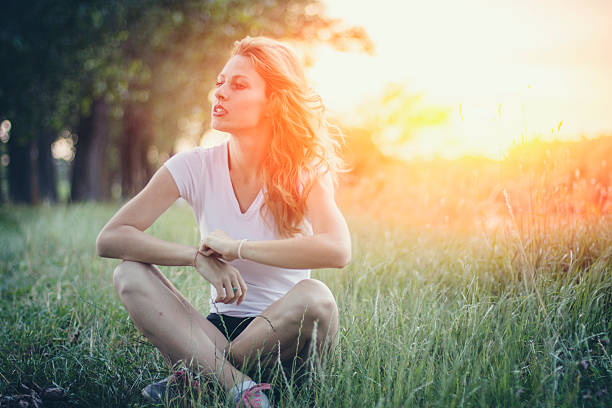 istock Woman in green grass 579739772
