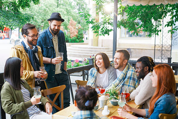 istock Friends in summer cafe 579741186