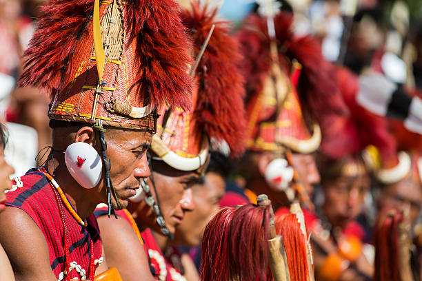 Hornbill Festival in India. Nagaland, India - December 4, 2013: Tribes of Nagaland at the annual Hornbill Festival in Kohima. The Hornbill is also known as the Festival of Festivals’. hornbill stock pictures, royalty-free photos & images