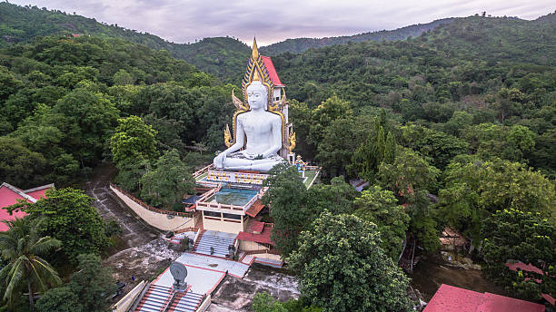 istock white big Buddha on the mountain 579741860