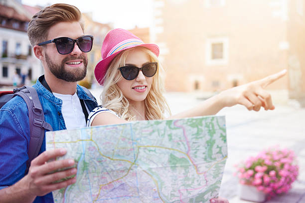 istock Couple visiting new touristic city 579742330