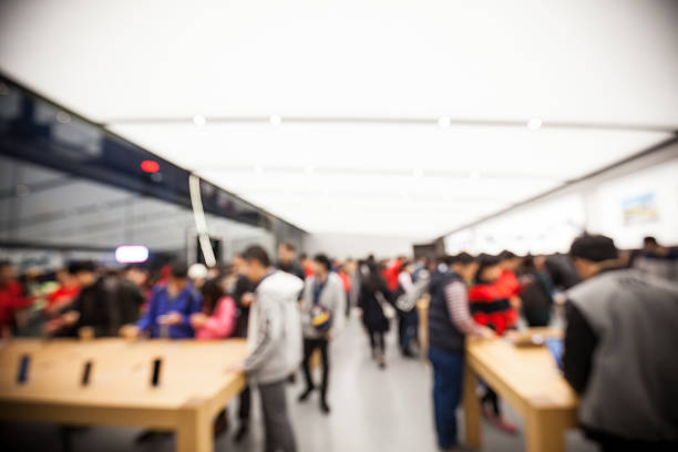 istock Defocused view of lots people in retail store 579742888
