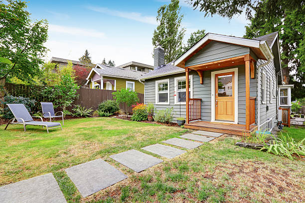 istock Small American house with gray exterior paint. 579743722