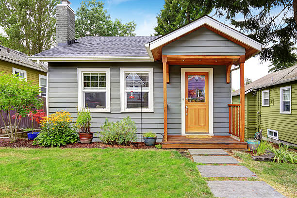 istock Small American house with gray exterior paint. 579743812