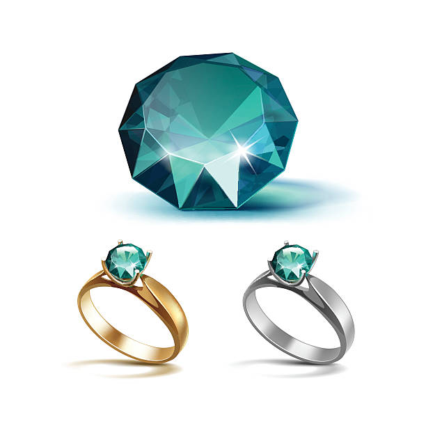 istock Gold and Siver Engagement Rings with Emerald Shiny Clear Diamond 579744472