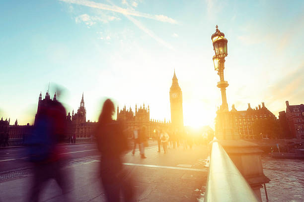 istock People walking on Westminster Bridge at sunset in London 579744576