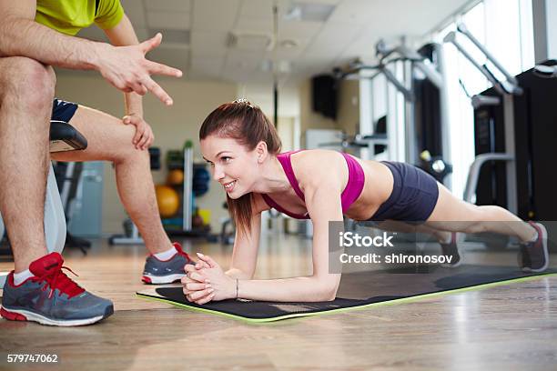 Doing Planks Stock Photo - Download Image Now - Active Lifestyle, Activity, Adult