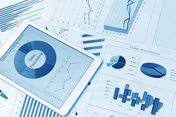 istock Financial charts on the table with tablet 579749090