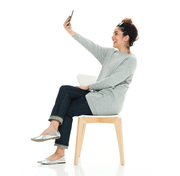 istock Cheerful woman taking a selfie 579752516