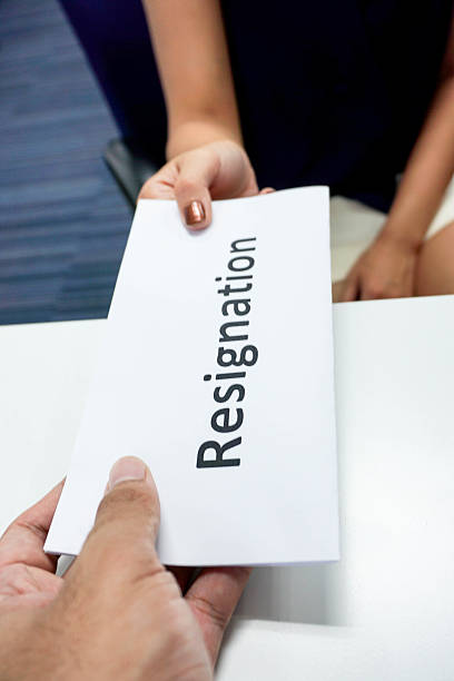 istock Close up submitting a resignation letter to the boss 579752730