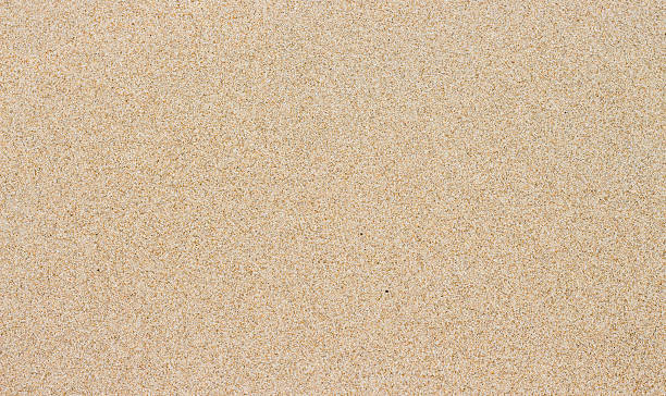 istock beautiful sand at nature beach texture 579753972