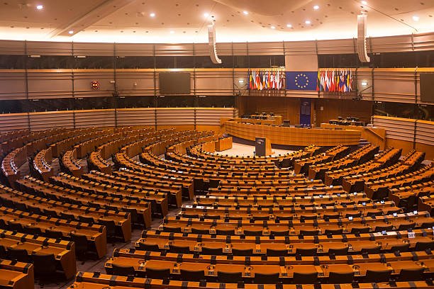 Parliamentary hemicycle of the European Union in Brussels Brussels, Belgium - July 23, 2015: The Parliamentary hemicycle of Espace Léopold as it is open for visitors on July 23, 2015 in Brussels. The parliamental buildings can be visited for free. european parliament stock pictures, royalty-free photos & images