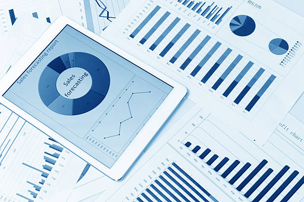 istock Financial charts on the table with tablet 579757740