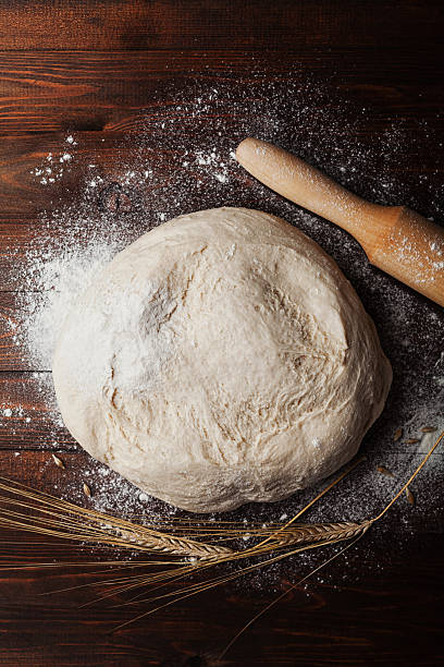 istock Dough with flour. Homemade pastry for bread or pizza 579758320