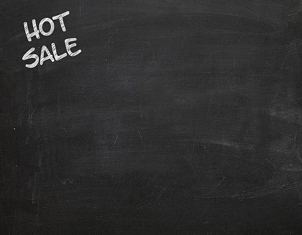 istock Hot Sale text chalkboard on black board 579758704