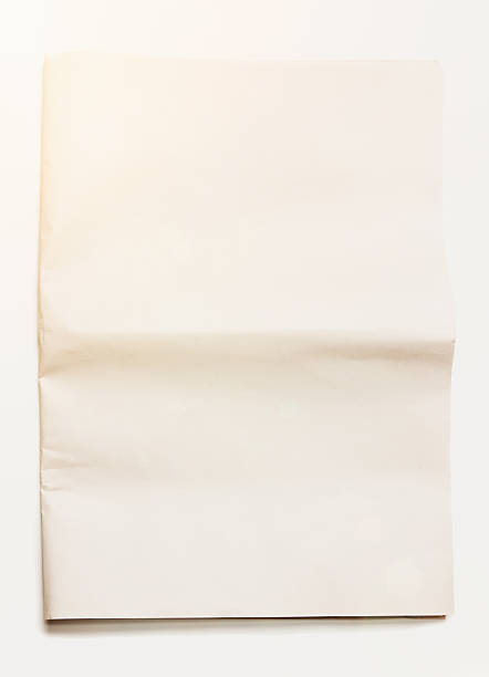 Blank newspaper front page ready for your headlines and pictures Ready for your headlines and pictures, the completely blank front page of a newspaper. front page stock pictures, royalty-free photos & images