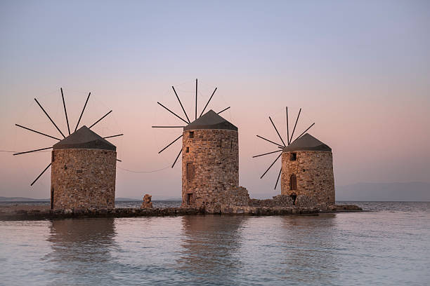istock Greek Island of Chios windmills at sunset 579760076