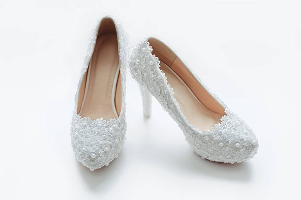 Elegant wedding shoes stock photo
