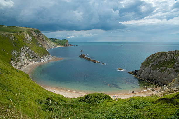 istock Man O' War Bay, Durdle Dor, Dorset England 579760658