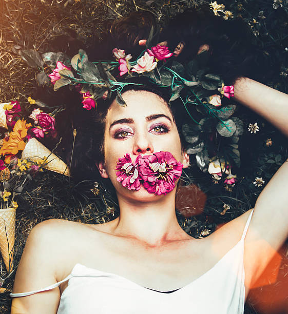 istock woman with flowers 579764538