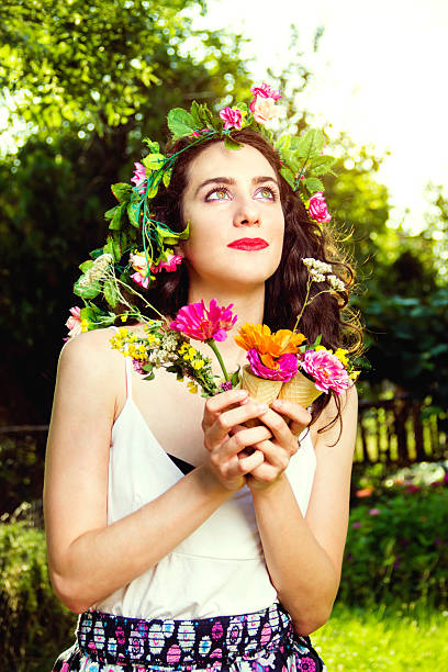 istock woman with flowers 579766206
