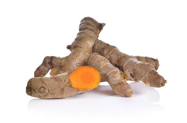 istock Fresh turmeric slices isolated on white 579767790