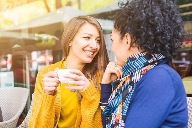 istock Lesbian couple having a coffee at a cafe 579768170